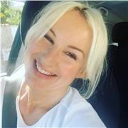 El profesora de Ingles imparte classes para adultos